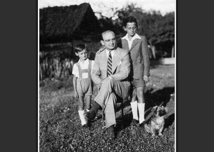 Emil Iliescu and his two sons, Ion, 12, and Cornell, 6,  on a Sunday after church looking down at our dog, Lucky, who didn't survive the bombing raids.
